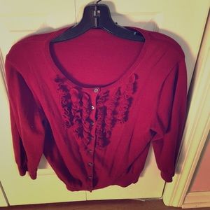 Ruffled red cardigan